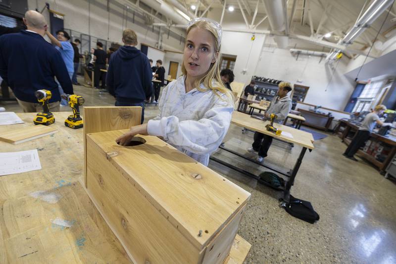 Lacey Updike talks about building the duck house in class Monday, Nov. 10, 2025, at Sterling High School. The class built 12 wood duck houses and six bluebird houses for the project.