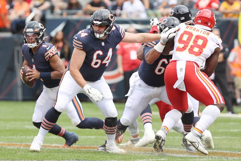 Chicago Bears guard Michael Schofield blocks for quarterback Justin Fields Sunday, Aug. 13, 2022, during their game against the Chiefs at Soldier Field in Chicago.
