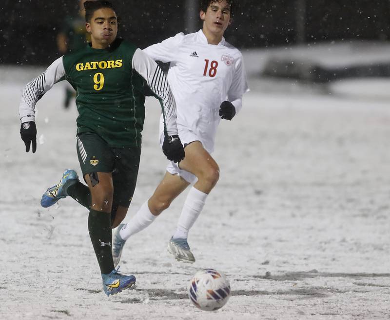 Crystal Lake South's Ali Ahmed races Timothy Christian's Ben Schroeder to the ball during the IHSA Class 2A Grayslake Central Supersectional soccer match on Tuesday, Oct. 31, 2023, at Grayslake Central High School.