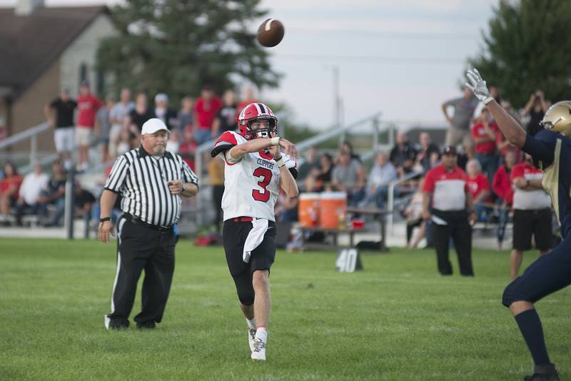 Amboy’s Tucker Lindenmeyer fires a pass down field Friday, Aug. 26, 2022 against Polo.