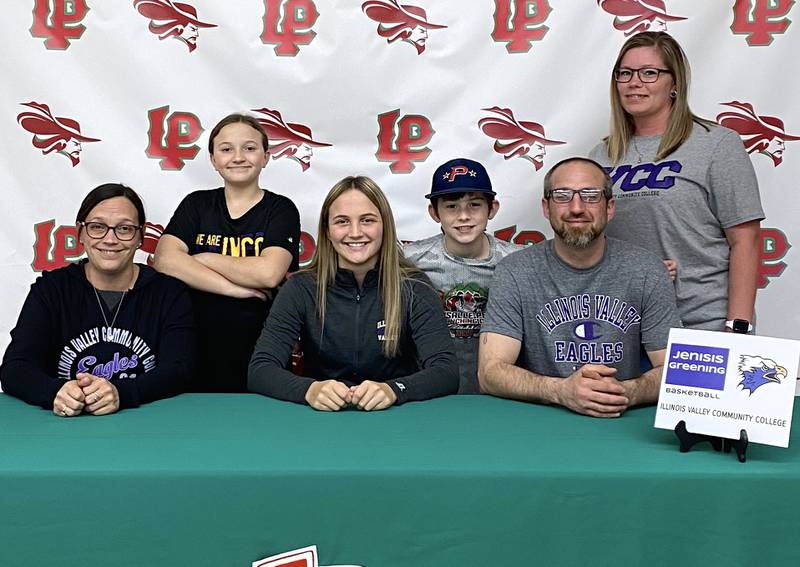 La Salle-Peru's Jenesis Greening (seated, third from left) signed to play basketball at IVCC. She was joined by (left to right) Kristin Cocking, Jazlynn Cocking, Ayven Michael, Kevin Greening and Amy Michael.
