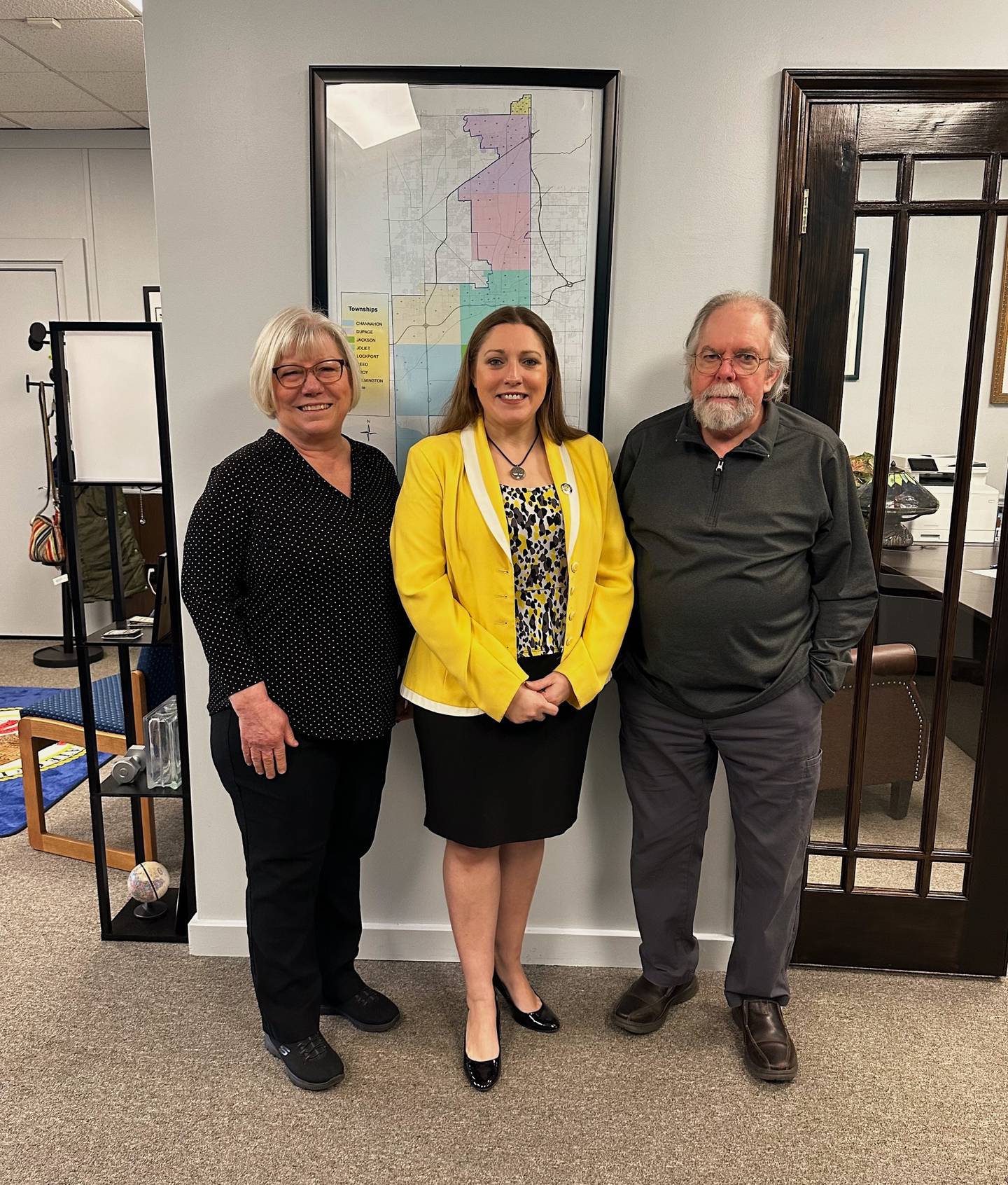 State Sen. Rachel Ventura, D-Joliet, (center) poses with Karen Pastell of Shorewood (left) and Karen Pastell's husband Paul Pastell (right). Ventura's office helped connect the Pastells with $10,000 of unclaimed property through ICash.