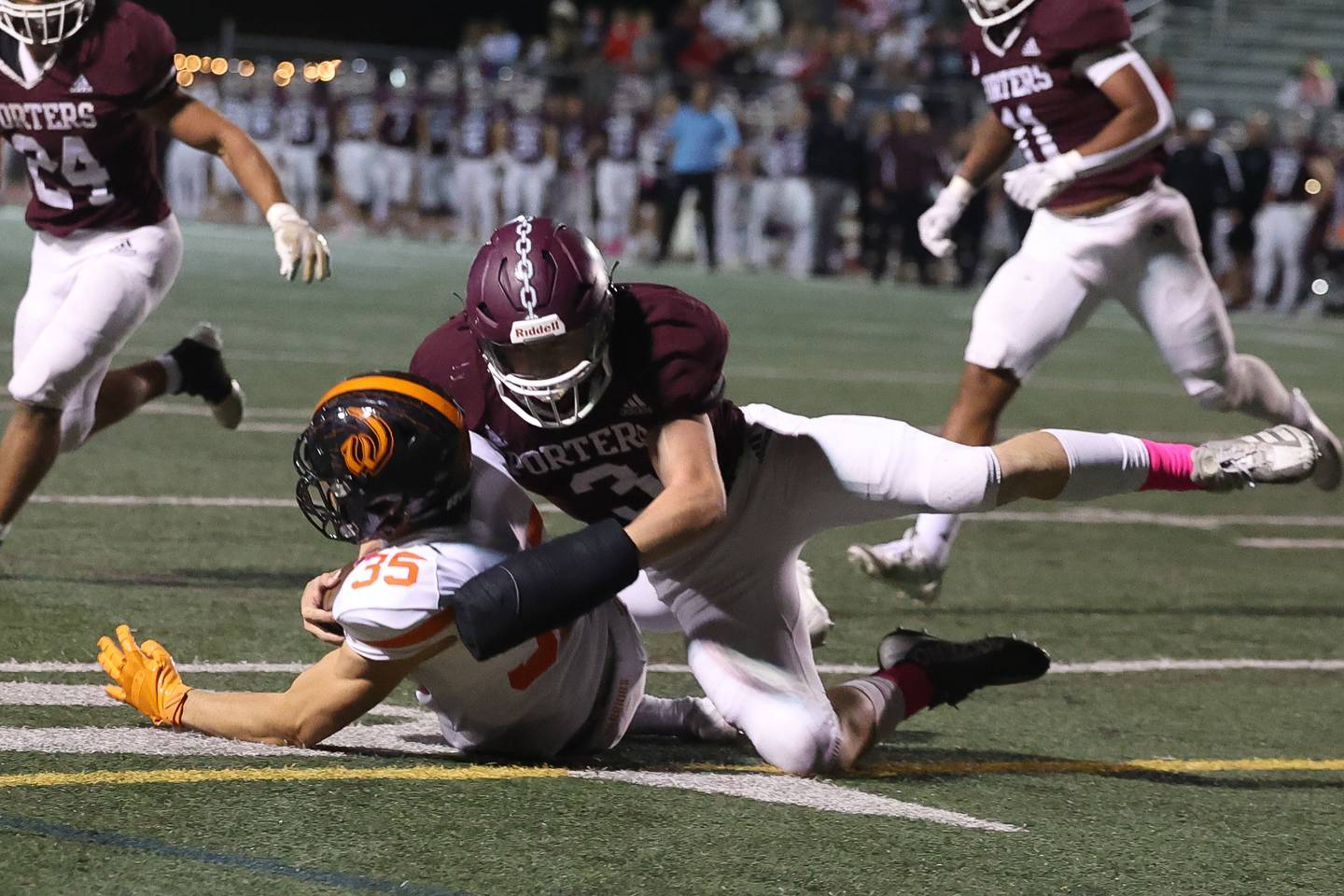 Lockport’s Colton Benaitis brings down the Lincoln-Way West punter in a contest last season.