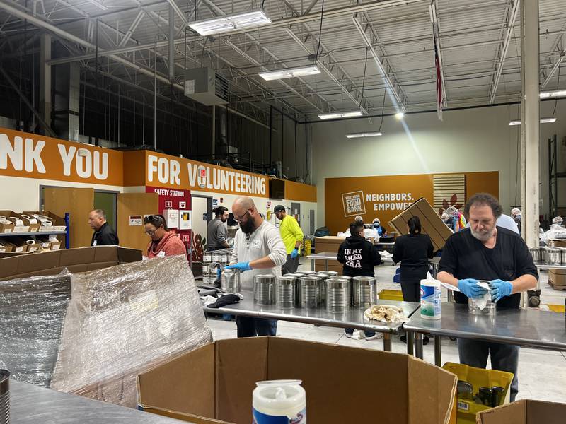 Hollywood Casino Joliet employees helped sort and bag food at the Northern Illinois Food Bank South Suburban Center in Joliet on Tuesday, Nov. 26.