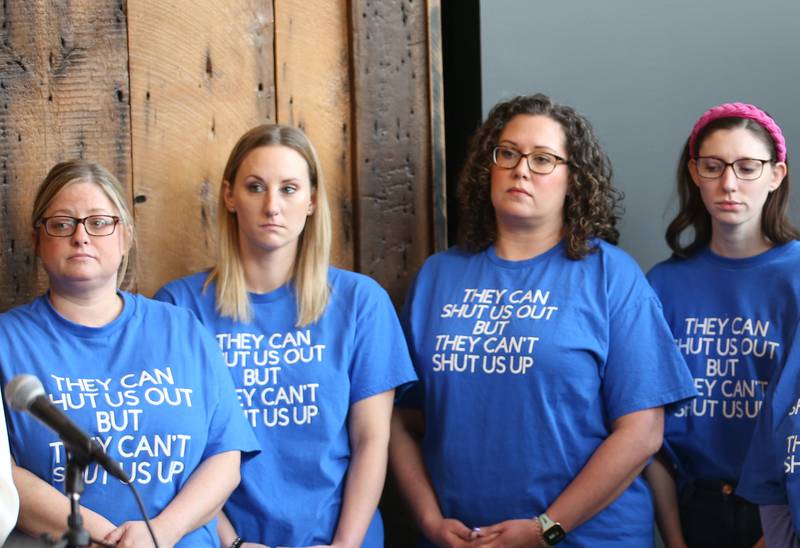 Former St. Margaret's Health-Peru OB nurses wear shirts that say "They can shut us out but they cant shut us up" during a press conference on Monday, Feb. 6, 2023 at Westclox in Peru.