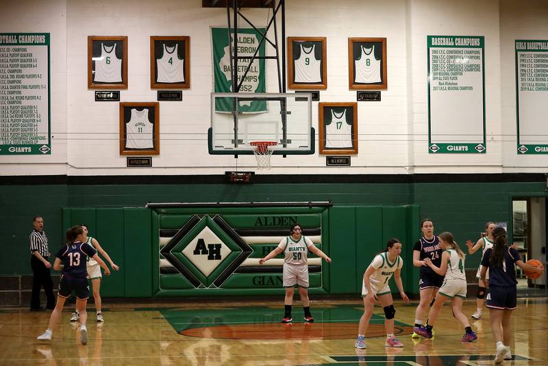 Banners from  Alden-Hebron’s 1952 State Championship hang in the gym during a nononference girls basketball game between  Alden-Hebron and Woodlands Academy on Thursday, Jan. 29, 2026, at Alden-Hebron High School in Hebron.