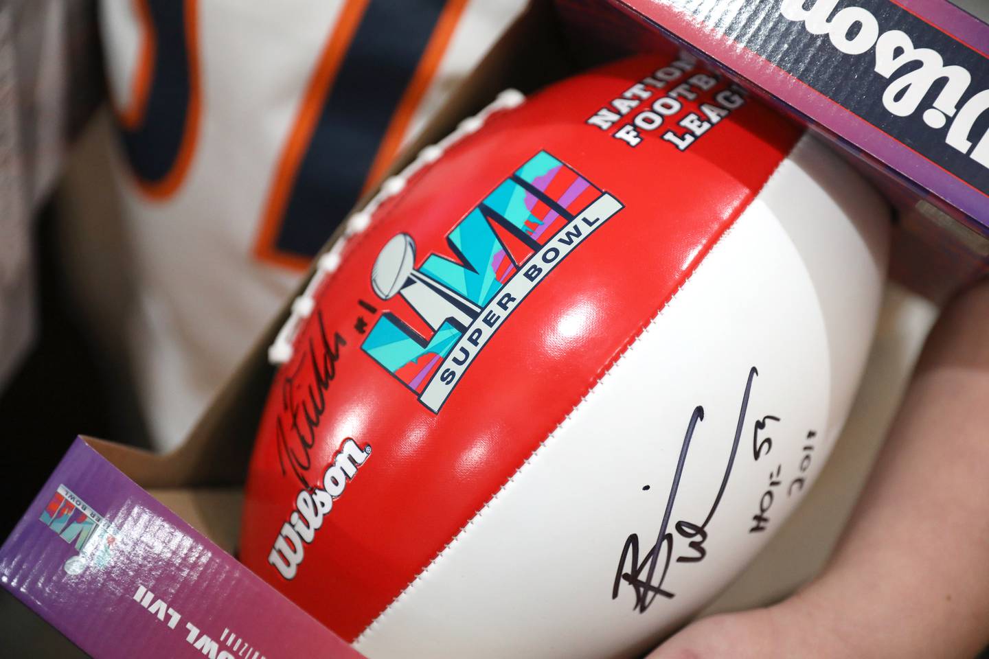 Matthew Kinsella, 11, of Elburn just returned from a trip sponsored by Make-A-Wish to Super Bowl LVII in Arizona. Kinsella shows off the football signed by former Chicago Bear Brian Urlacher.
