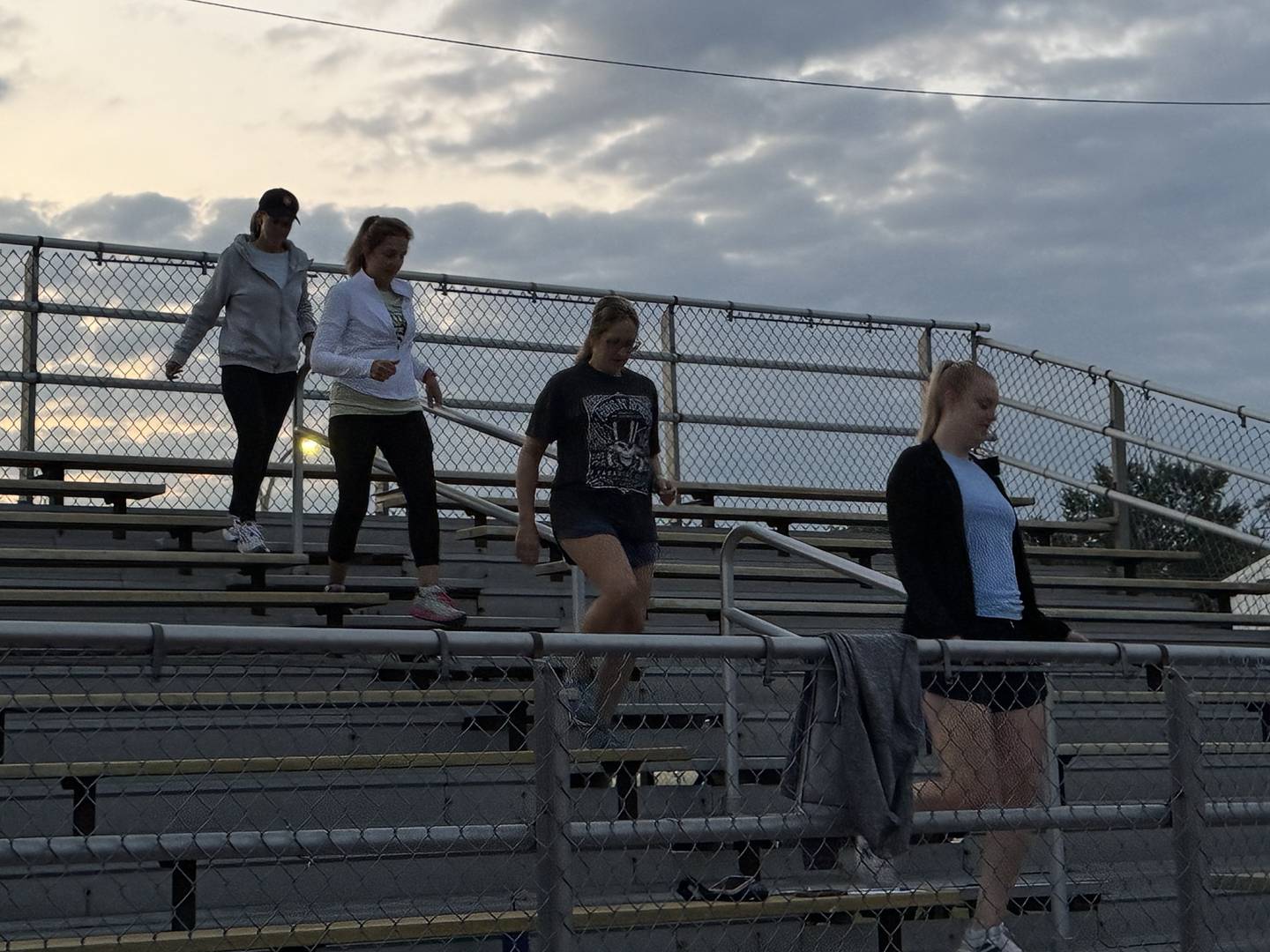 Morris Hospital employees and area first responders gathered Thursday morning at the bleachers at Morris Community High School to march up and down them 110 times, commemorating the efforts of first responders in September 11, 2001.