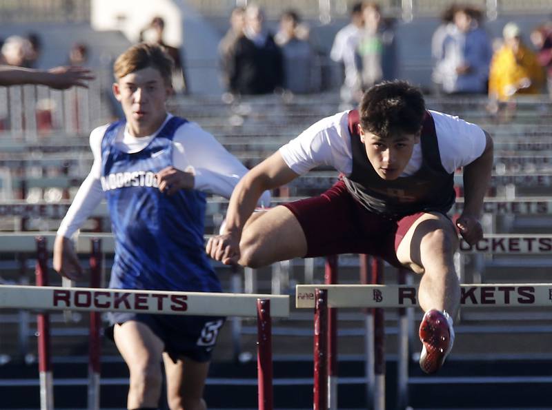 Prairie Ridge's Alexander Trejo flies over a hurdle on his way to winning the 110 meter high hurdles during the IHSA Class 2A Richmond-Burton Sectional Boys Track and Field Meet on Wednesday, May 20, 2026, at Richmond-Burton High School.