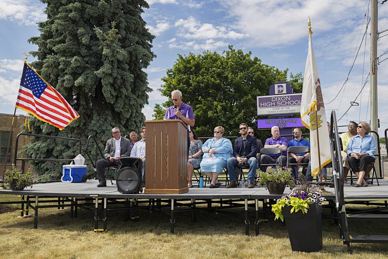 Dixon Mayor Glenn Hughes speaks to the crowd during a ceremony naming the road in front of Dixon High School as “Mark Dallas Way” on Tuesday, May 30, 2023.