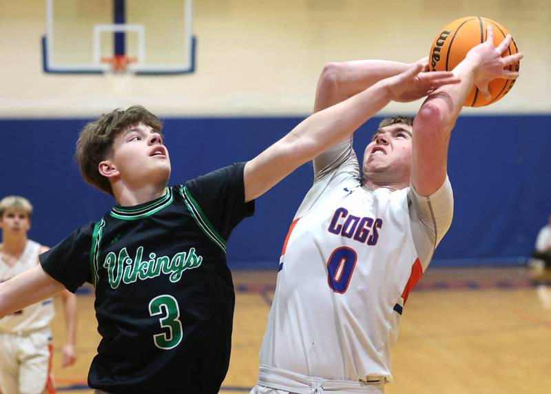 Genoa-Kingston's Nathan Kleba shoots over North Boone's Gage Vermett during their Class 2A regional game Monday, Feb. 24, 2025, at Genoa-Kingston High School.