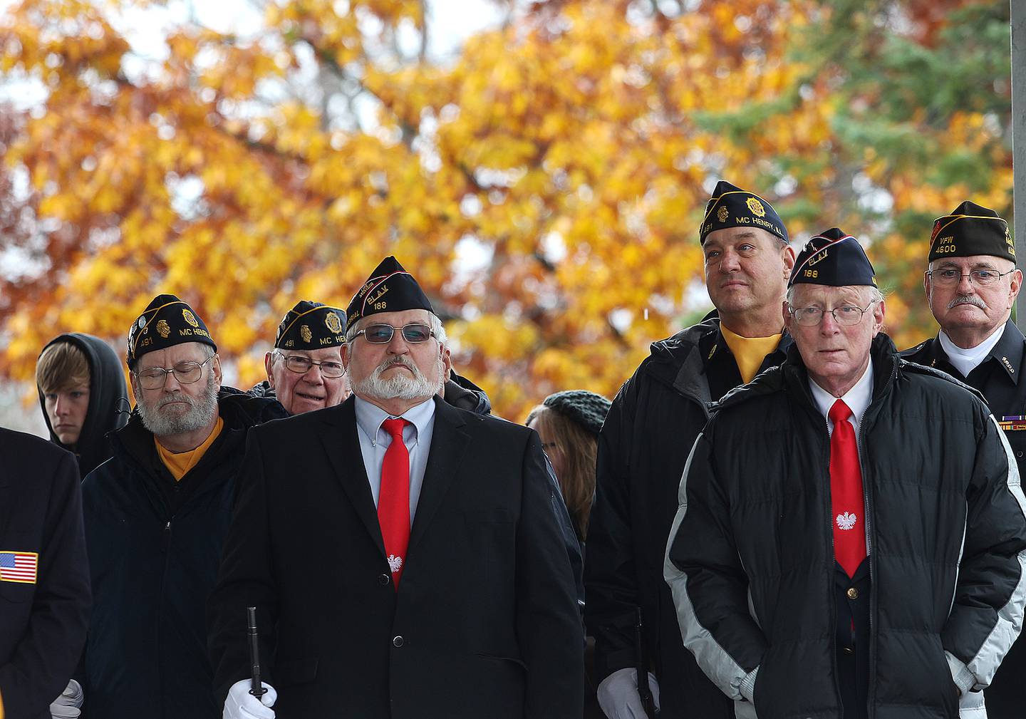 Members of the Polish Legion of American Veterans stands with the crowd during the unveiling ceremony of the Vietnam War memorial in 2014 in McHenry. The monument was built in honor of four McHenry High School graduates killed in Vietnam. The memorialized included John Granath Jr., killed at 20; Glenn Davis, killed at 22; Carter Freund, killed at 22; and James Ambrose, killed at 23.