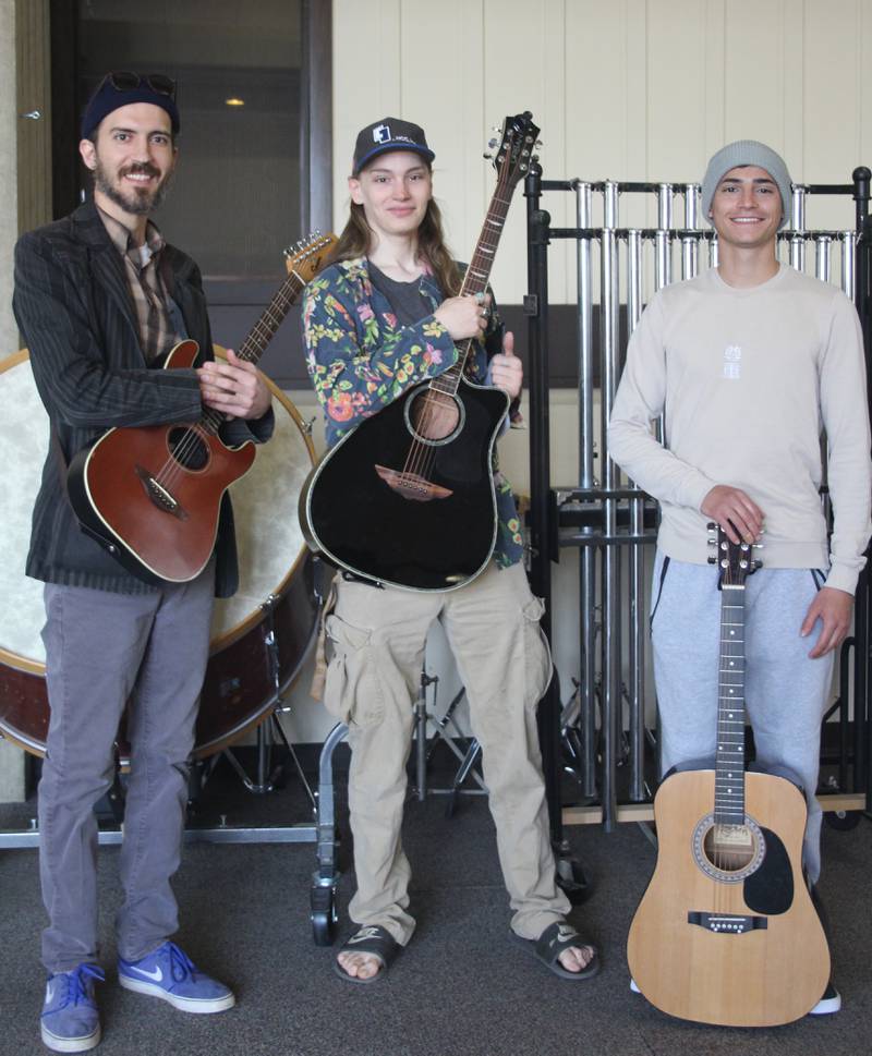 Music instructor Kevin Kramer (left) with Illinois Valley Community College music students.