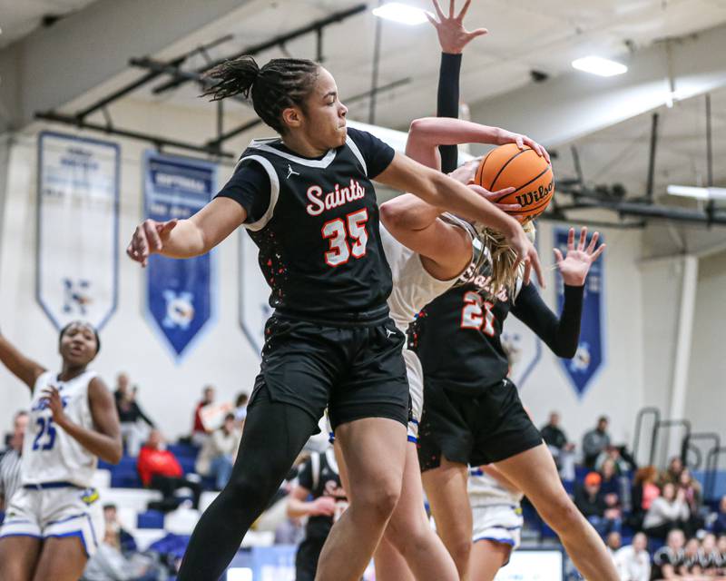 Saint Charles East's Corinne Reed (35) challenges a shot during their Coach Kipp's Hoopfest basketball game between Lyons at St Charles East. Jan 18, 2025 in La Grange.