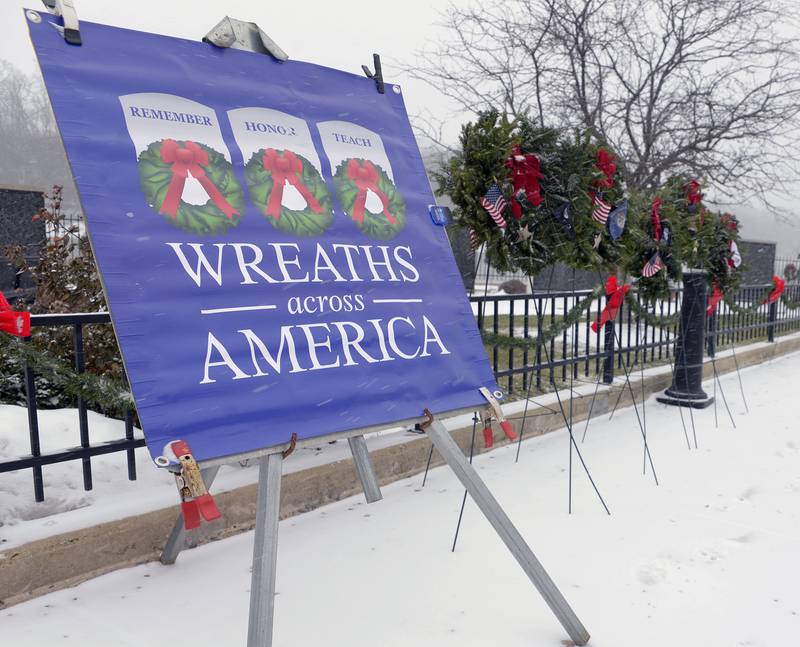 Over 100 wreaths were placed along he Middle East Conflicts Wall Memorial in Marseilles Saturday during the eighth annual Wreaths Across America.