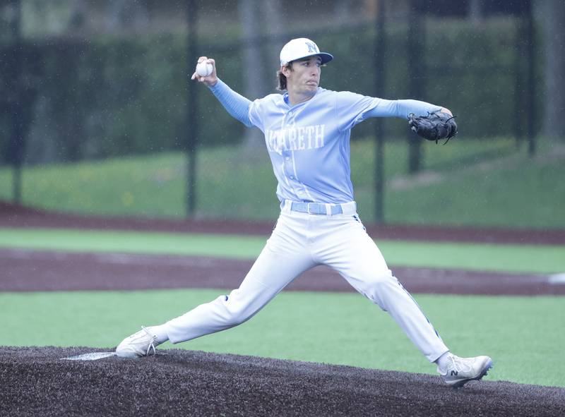 Nazareth's Chase Zidlicky (30) pitches during the varsity baseball game on Wednesday, April 20, 2025 between Nazareth and Joliet Catholic academies in La Grange Park.