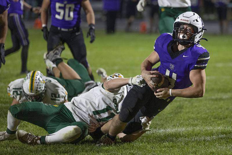 Dixon’s Landon Knigge fights for yards against Coal City Friday, Nov. 7, 2025.