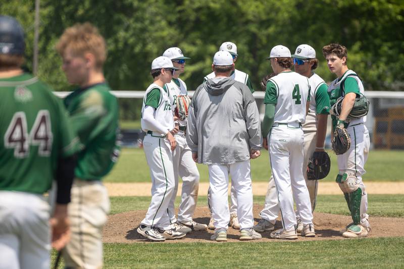 St. Bede players meet on mound on Saturday, May 24, 2025 at Stark County High School in Toulon.