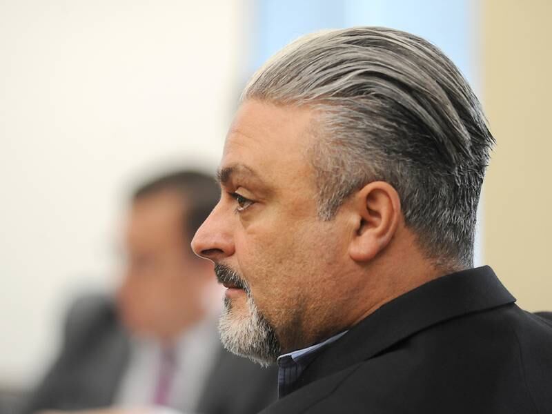 Tony Colatorti testifies Thursday, April 14, 2022, during a hearing of McHenry County electoral board at the McHenry County Administration Building in Woodstock. The board was to determine if Colatorti can remain on the ballot following an objection by William Brogan and Joel Brumlik over his qualifications to run for the position of McHenry County sheriff.