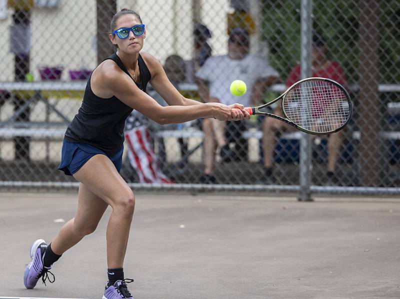 Brooklyn Arjes returns a shot during a doubles match Thursday, July 27, 2023 at the Emma Hubbs Tennis Classic in Dixon.