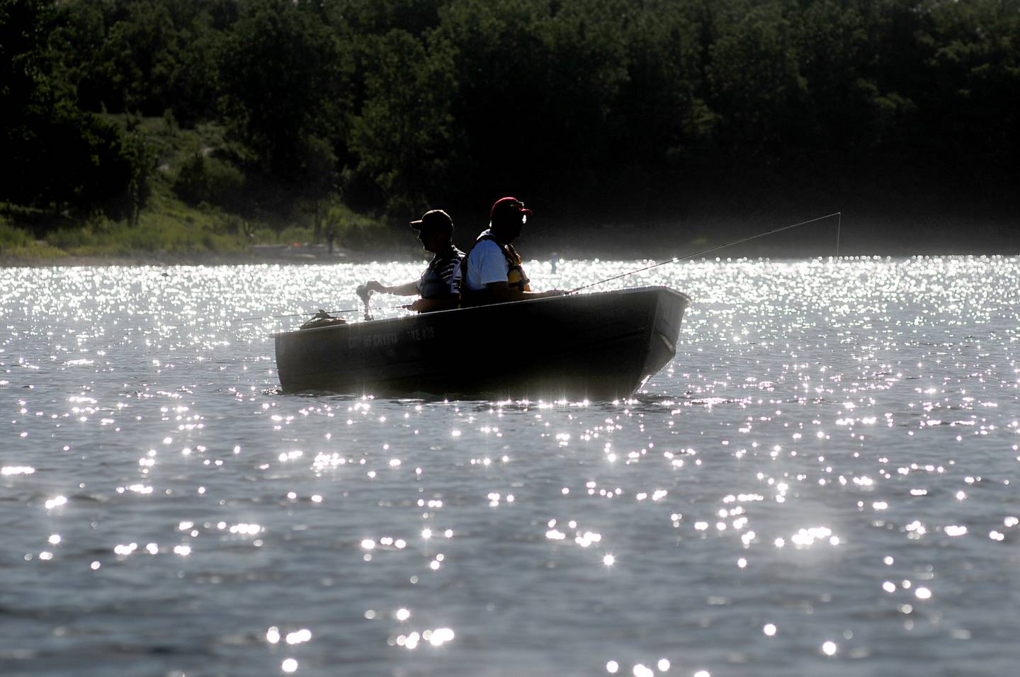 Bill Gerarpin, right, and Ken Hauser fish Thursday, June 16, 2022, during the McHenry County Detachment Marine Corps League 1009’s Fishing Derby at Three Oaks Recreation Area in Crystal Lake. Around 15 veterans from several branches of the armed services took part in the annual event that helps veterans get together and experience fishing.