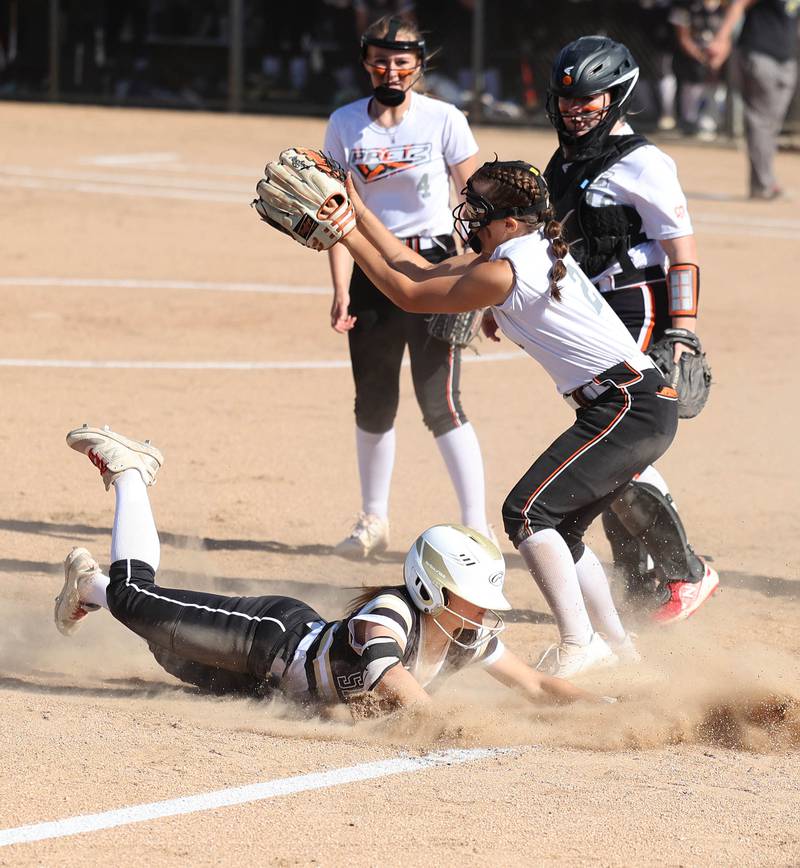 Sycamore's Addison McLaughlin slides safely into third as Freeport's Kailen Pro takes the throw during their Class 3A regional championship game Friday, May 26, 2023, at Sycamore High School.
