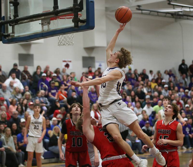 Serena's Tanner Faivre draws an offensive foul on Earlville's Griffin Cook during the Little Ten Conference Championship on Friday, Feb. 2, 2024 at Somonauk High School.