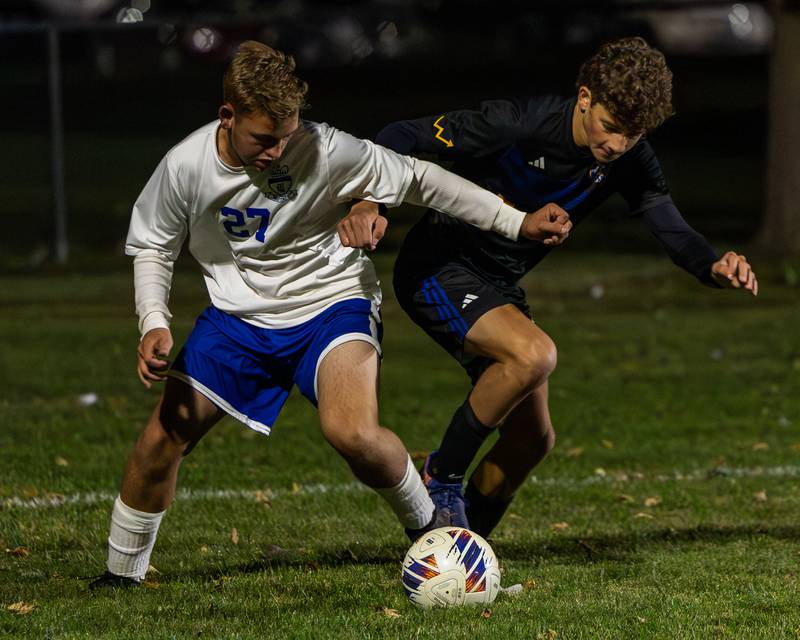 Matthew Badal (27) of Hinckley-Big Rock and (9) of Somonauk/Leland/Newark fight over possession of ball during the Little Ten Conference Championship match on Thursday, Oct. 9, 2025 at Hinckley-Big Rock School in Hinckley.