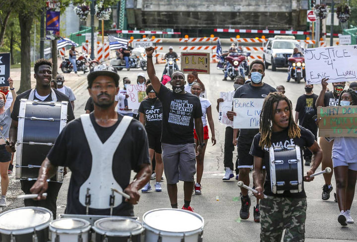 Demonstrators can be seen protesting outside Joliet City Hall, the Will County Courthouse and the Joliet Police Department on Saturday, Aug. 22, 2020, in response to the January 28 overdose death of Eric Lurry who died in police custody.