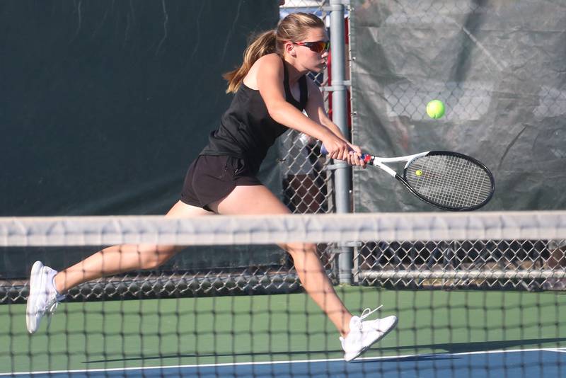 Ottawa's Savannah Frederickson chases down the ball while playing tennis on Tuesday, Sept. 16, 2025 at Ottawa High School.