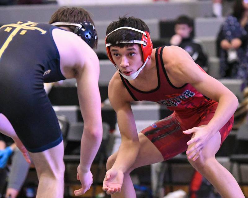 Jesus Martinez of Streator wrestles against Ryan Alaimo of Yorkville Christian during the 132-weight class regional championship match held on Saturday Feb. 8, 2025, held at Kaneland High School.