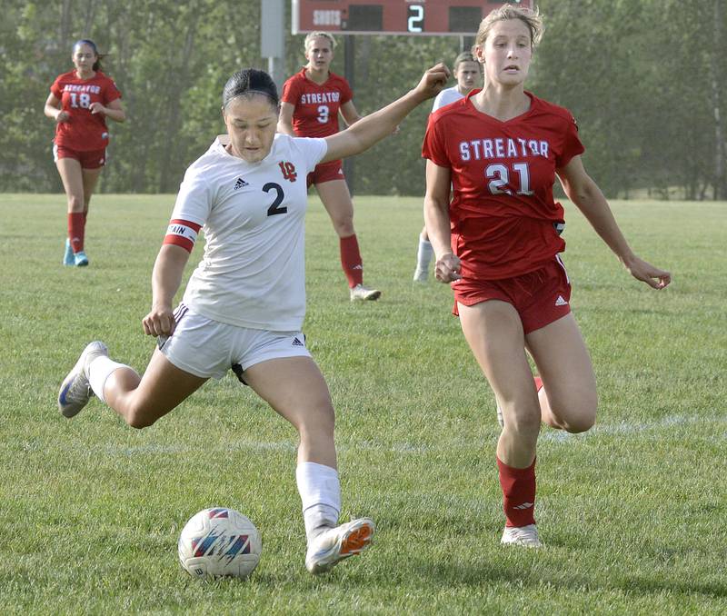 La Salle-Peru’s Vicky Tejada (2) gets the angle on Streator’s Rhea Huey (21) and readies what would prove to be the game-winning shot in the second half of the old rivals' regional opener Friday, May 16, 2025, at the James Street Recreation Area in Streator.