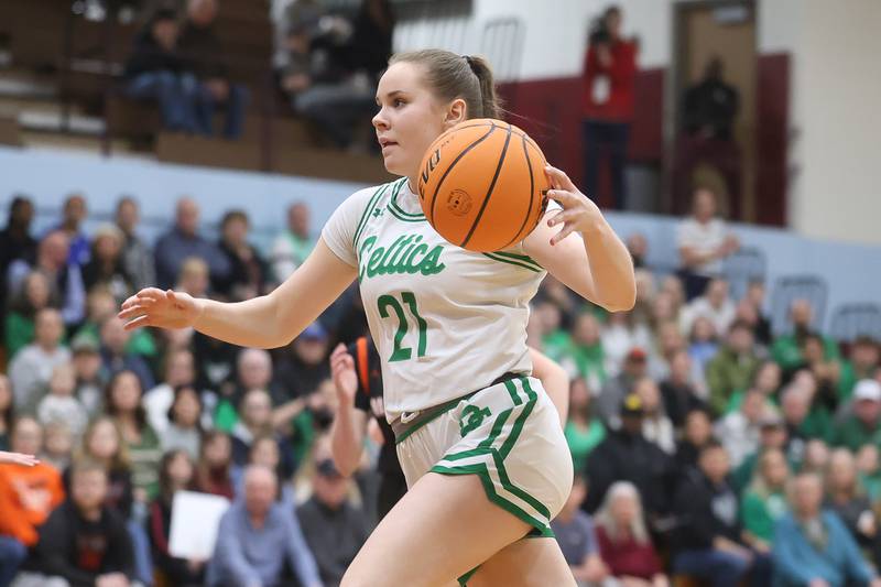 Providence’s Taylor Healy drives to the basket against Washington in the Class 3A Kankakee Super-Sectional game on Monday, March 3, 2026 in Kankakee.