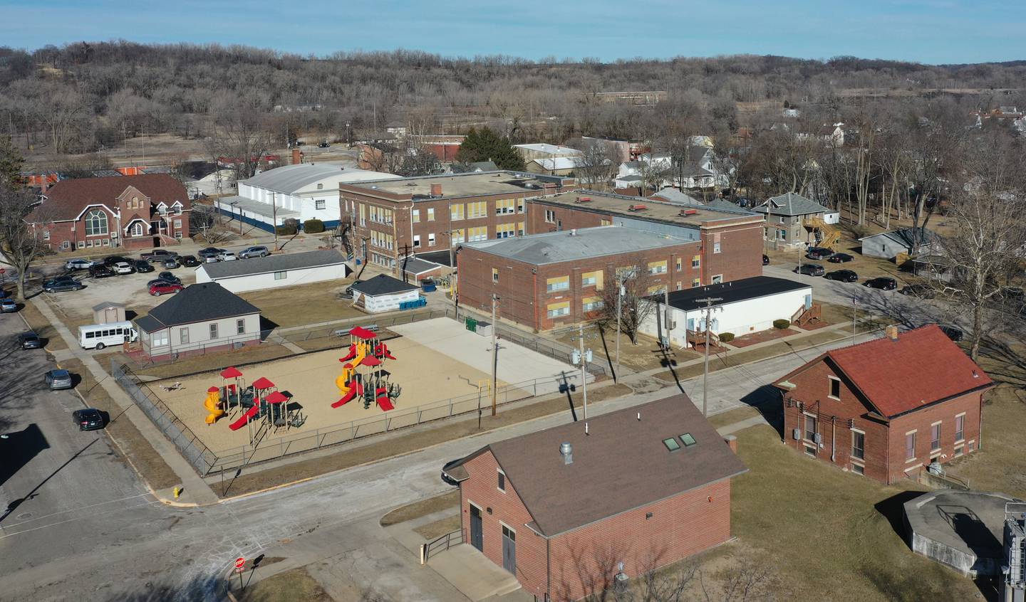 A view of the DePue Village Hall, Clerks office and School on Tuesday, Jan. 28, 2025 in DePue. President Donald Trump authorized action to end “radical and wasteful government DEI programs and preferencing.” A $23 million dollar grant was halted for a new wastewater treatment plant in DePue, Illinois, where heavy rains have caused sewage backup in people’s basements.