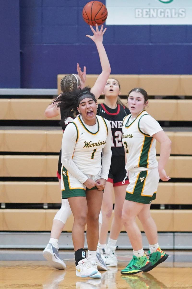 Waubonsie Valley's Arianna Garcia (1) reacts after scoring a basket late in the 4th quarter of play against Benet during a Class 4A Oswego Sectional final basketball game at Oswego High School on Thursday, Feb 22, 2024.