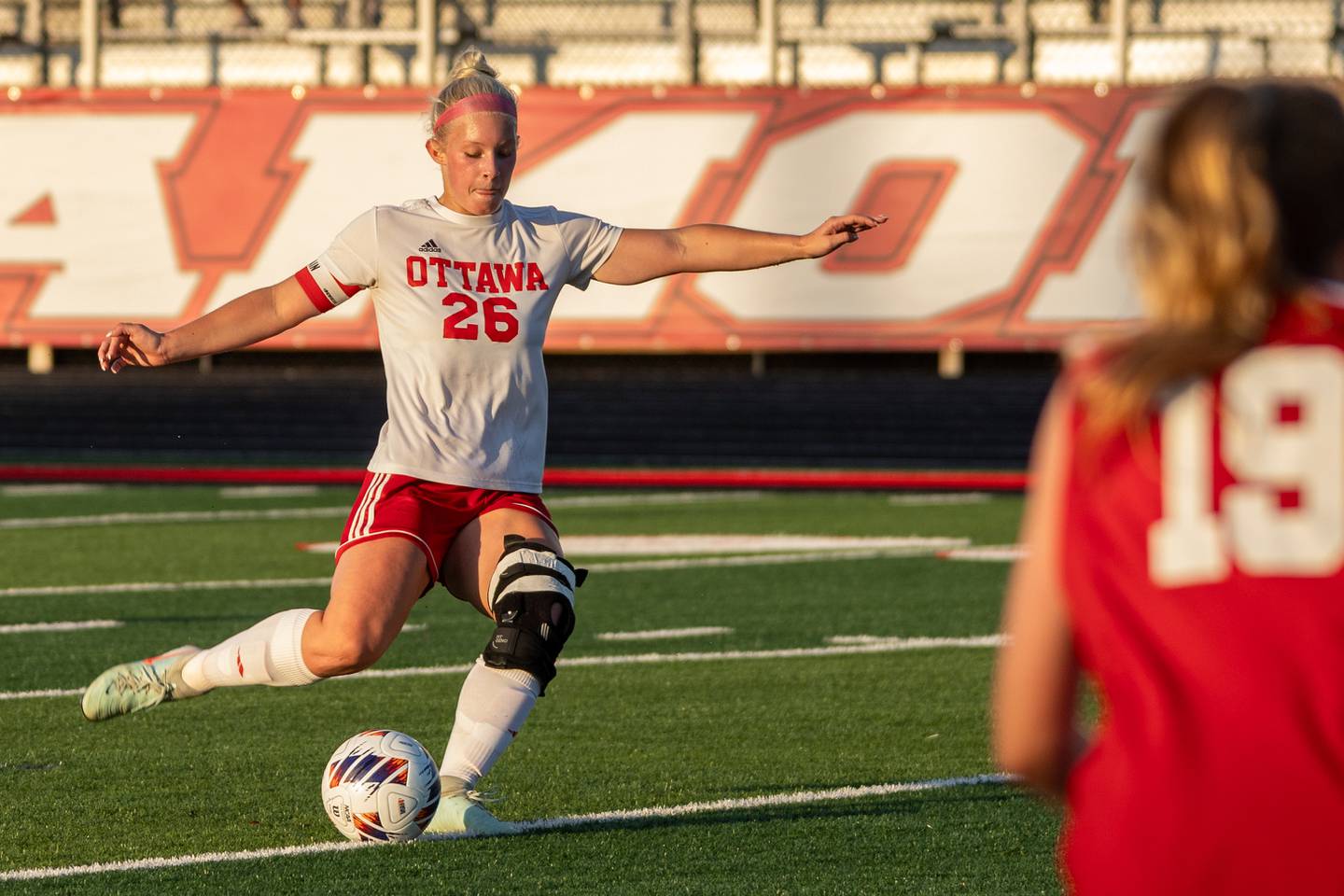 Taylor Brandt (26) of Ottawa kicks ball on Tuesday, May 21, 2025 at Malone Field in Metamora.