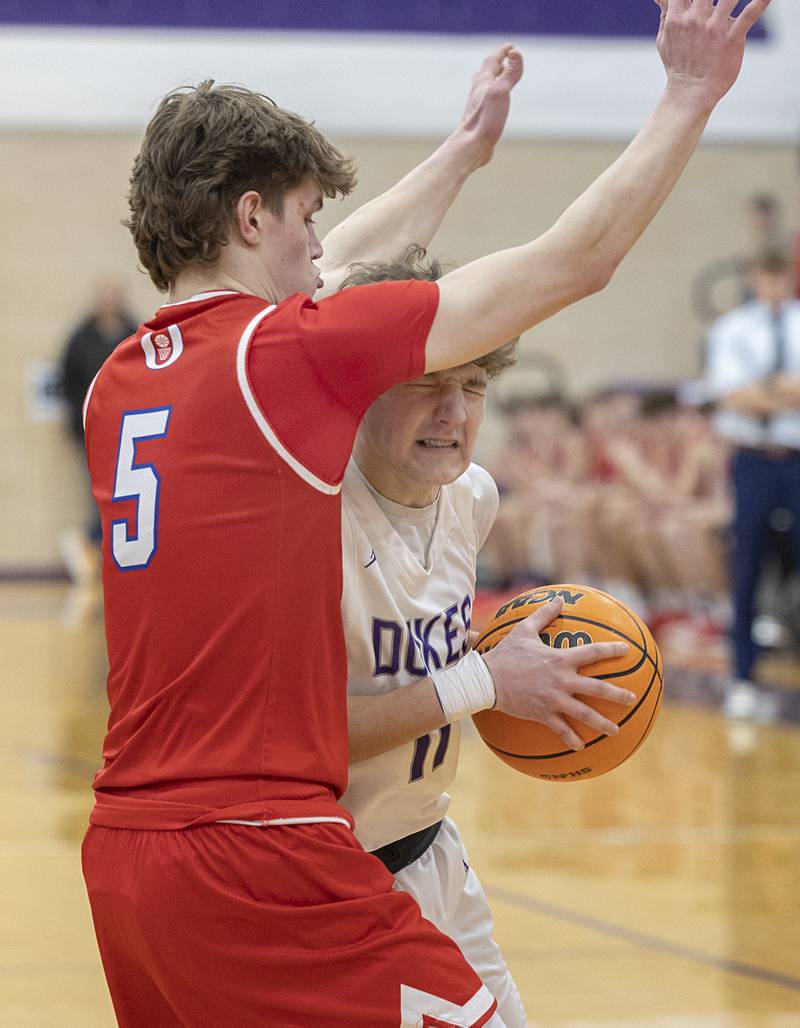 Dixon’s Brody Nicklaus tries to get a foul called against Oregon’s Tucker O’Brien Tuesday, Feb. 3, 2026.
