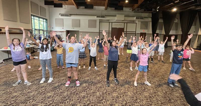 Students participating in Woodlawn Arts Academy’s fall musical theater program rehearse songs and choreography for their upcoming performances of “Finding Nemo Kids.” The show will be performed Oct. 11-13 at Centennial Auditorium at Sterling High School.