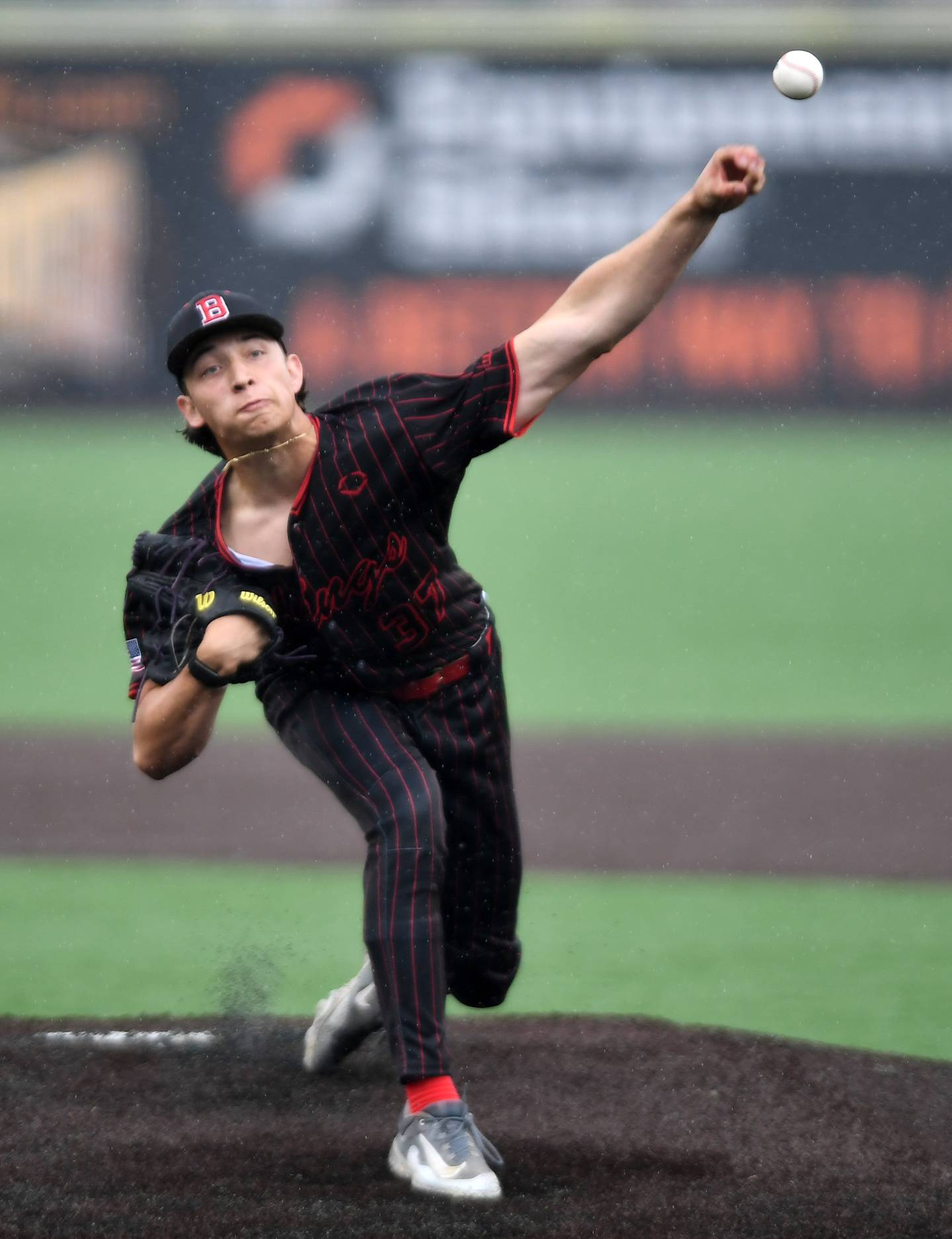 Benet Academy starter Jake Rifenburg delivers a pitch against Cary-Grove during the Class 3A state baseball semifinal at Slammers Stadium on Friday, June 13, 2025 in Joliet.