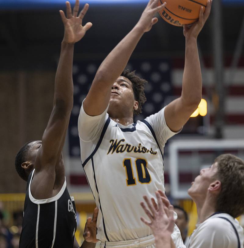 Sterling’s Koby Bell works below the basket against Galesburg Tuesday, Feb. 10, 2026.