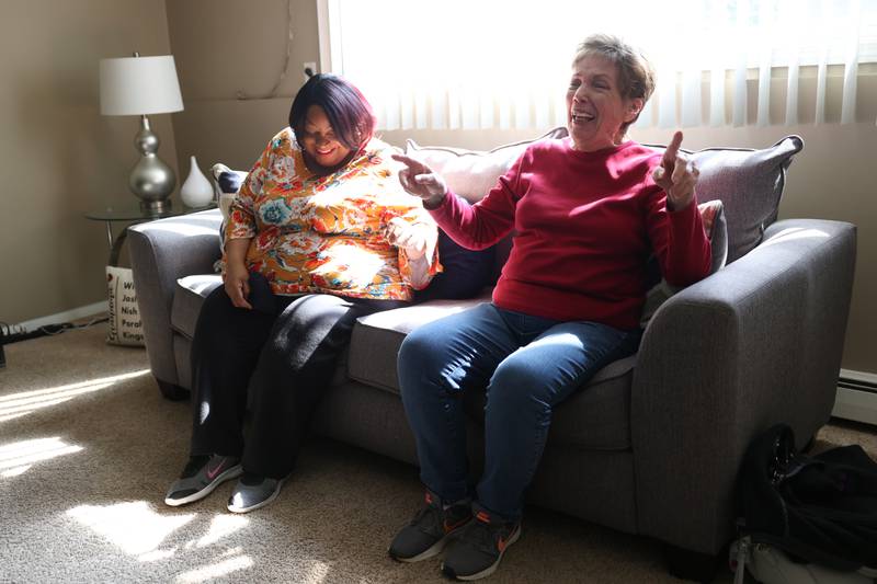 Senior Companion volunteer Karen Stromberger, right, spends time Josephine Simmons at her home in Crest Hill. Catholic Charities Senior Companion Program offers adults age 55 and older the opportunity to support and interact with their homebound peers. Wednesday, April 27, 2022, in Crest Hill.