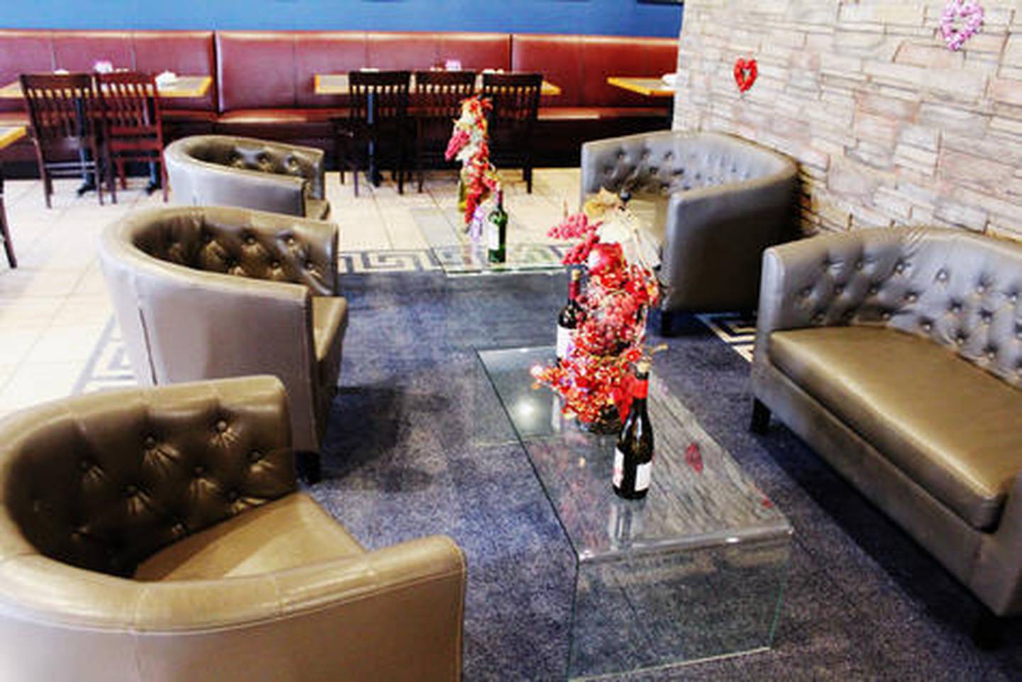 Just want to share a bottle of wine? Costa's has comfortable chairs to sit and sip in.