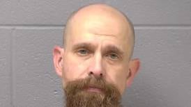 Plainfield Township man charged with battery after barricading himself inside house