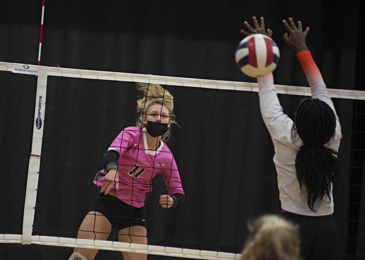 Rock Falls' Maya Sands spikes the ball against Byron Tuesday, Oct. 5, 2021 against Byron.