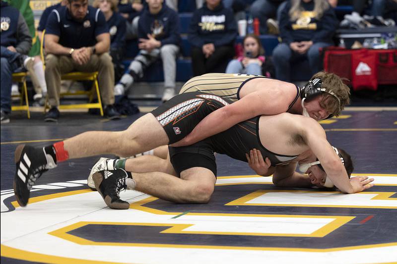 Sterling’s Chase Ullrich beats East Moline’s Chase Cassini in the 182 pound third place match at the Sterling wrestling regional.
