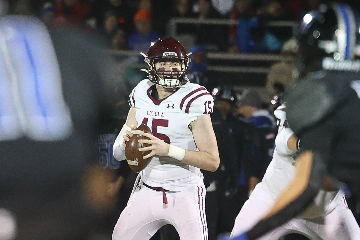Loyola’s Ryan Fitzgerald looks to pass against Lincoln-Way East in the Class 8A semifinal on Saturday, Nov. 23, 2024 in Frankfort.