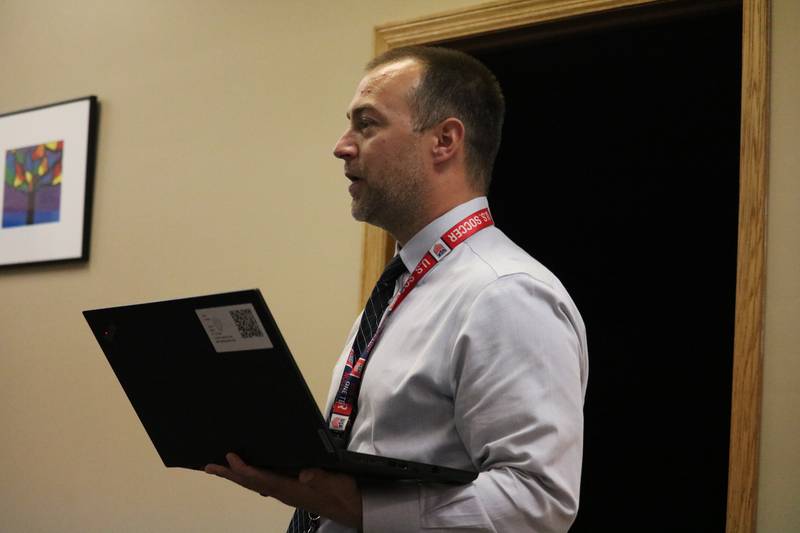 Kyle Gerdes, director of student services and homeless liaison for DeKalb District 428, gives a report to the school board at the Aug. 16, 2022 meeting of the DeKalb District 428 School Board.