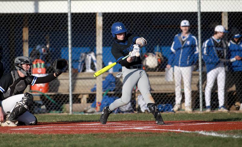 St. Charles North’s Mason Netcel makes contact during a game on Tuesday, April 8, 2025 at Burlington Central.