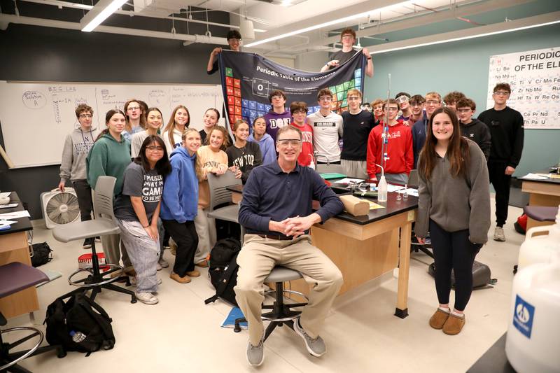 Downers Grove North Science Department Chairperson Michael Heinz with his honors chemistry class at the school.