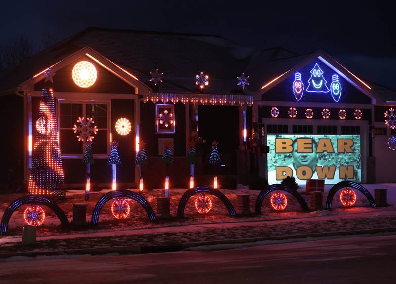 A Chicago Bears light show put together by Tim Caravia and his family plays Friday, Jan. 16, 2025, at his home on Dustin Drive in Sycamore. The show will run from 5:30 to 9:00 p.m. most days until the Bears season ends.
